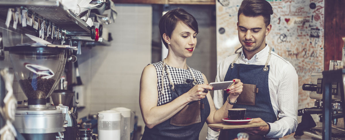 tf-instagram-4 Two restaurant workers take mobile photo of latte