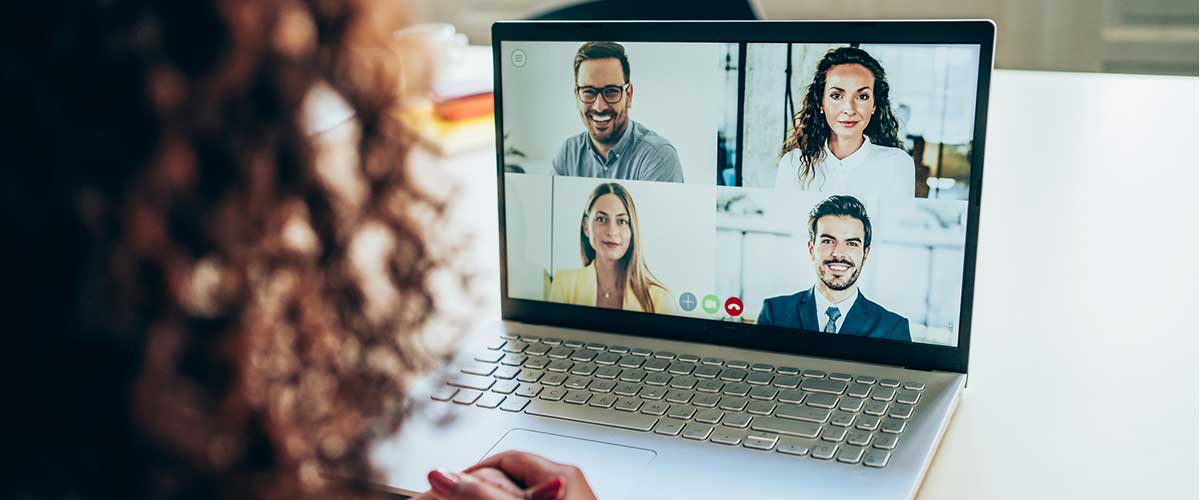 digital-marketing-trends-video Woman participating in video meeting on laptop
